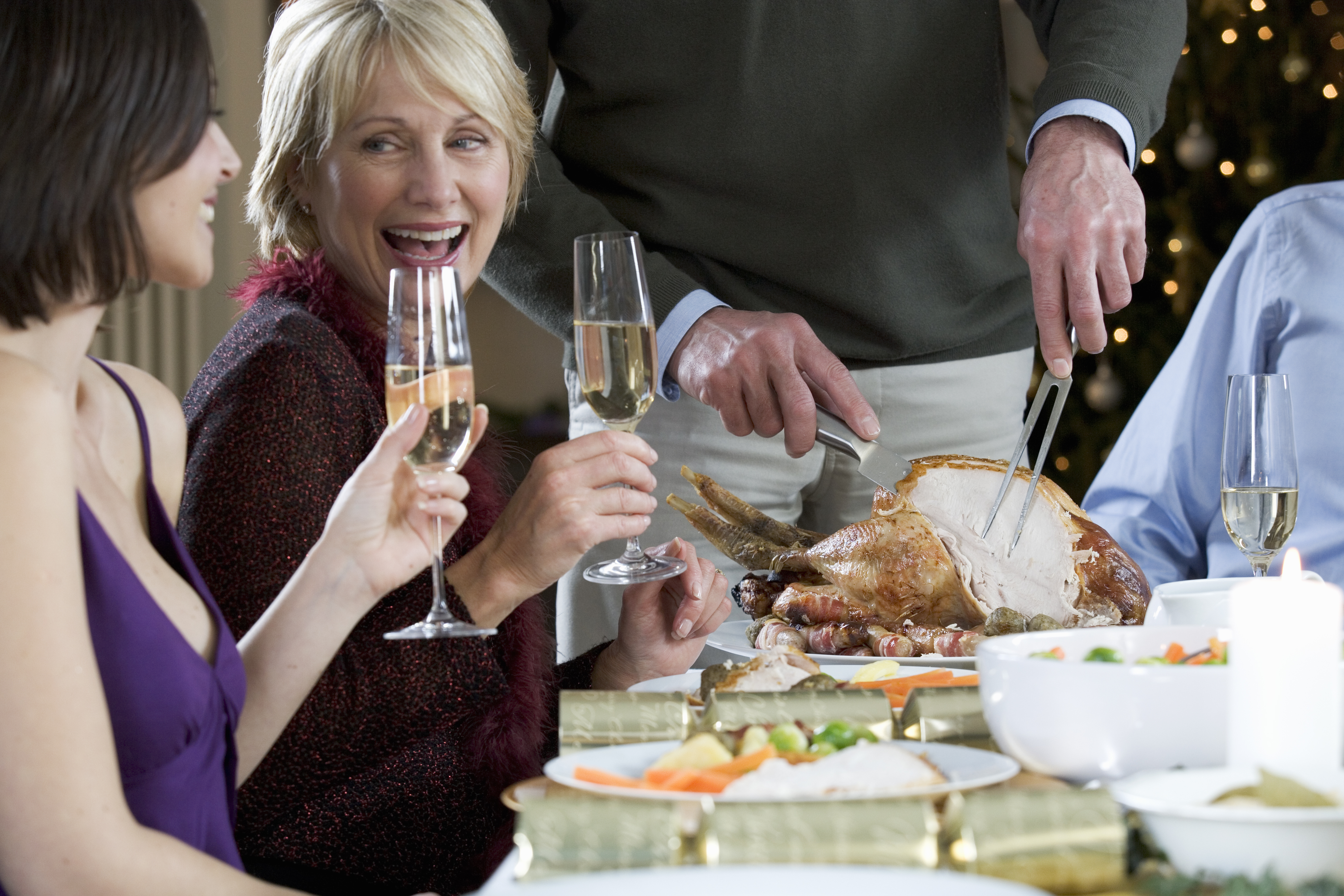 A family sitting down for Christmas dinner