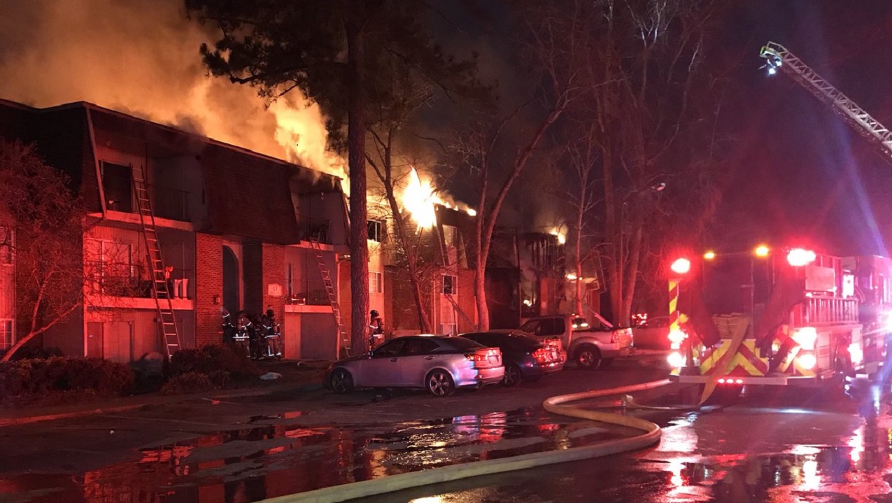 Firefighters Catch Children Being Thrown From Burning Building