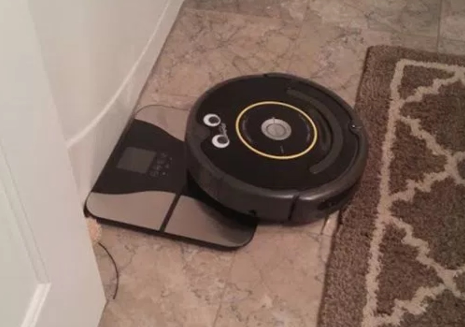 Roombas Caught Getting It On With Bathroom Scales