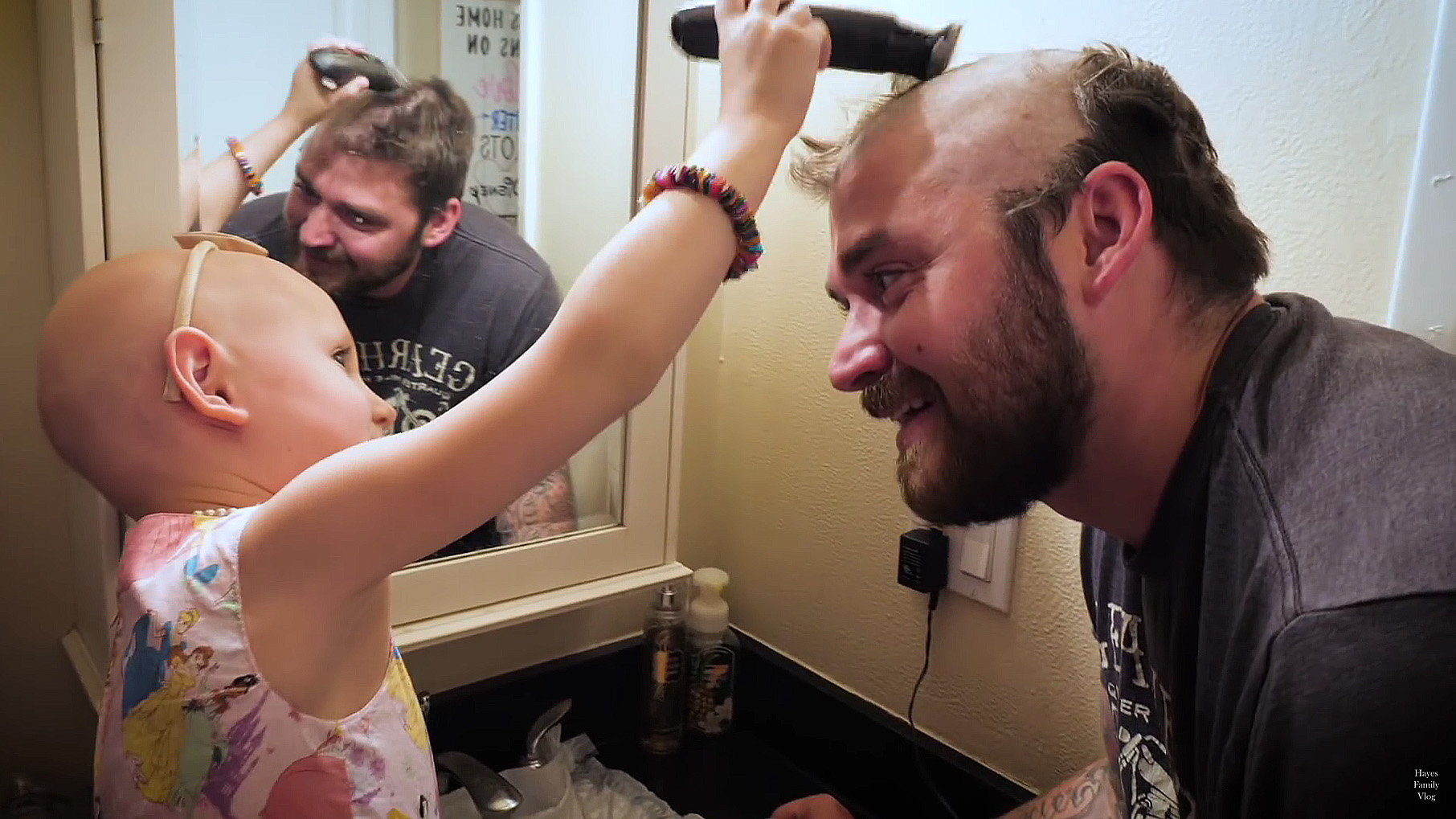 Dad Shaves Head To Match His Daughter