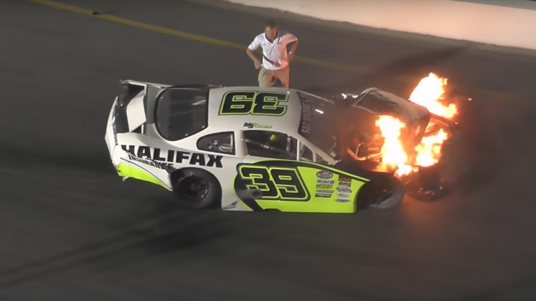 Dad Rushes Onto Track To Free His Son From A Burning Racecar