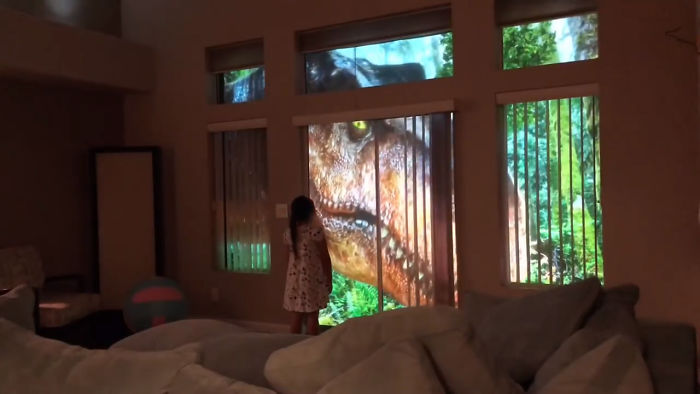 Stagehand Dad Creates Incredible Projector Surprise For Dino-Obsessed Daughter