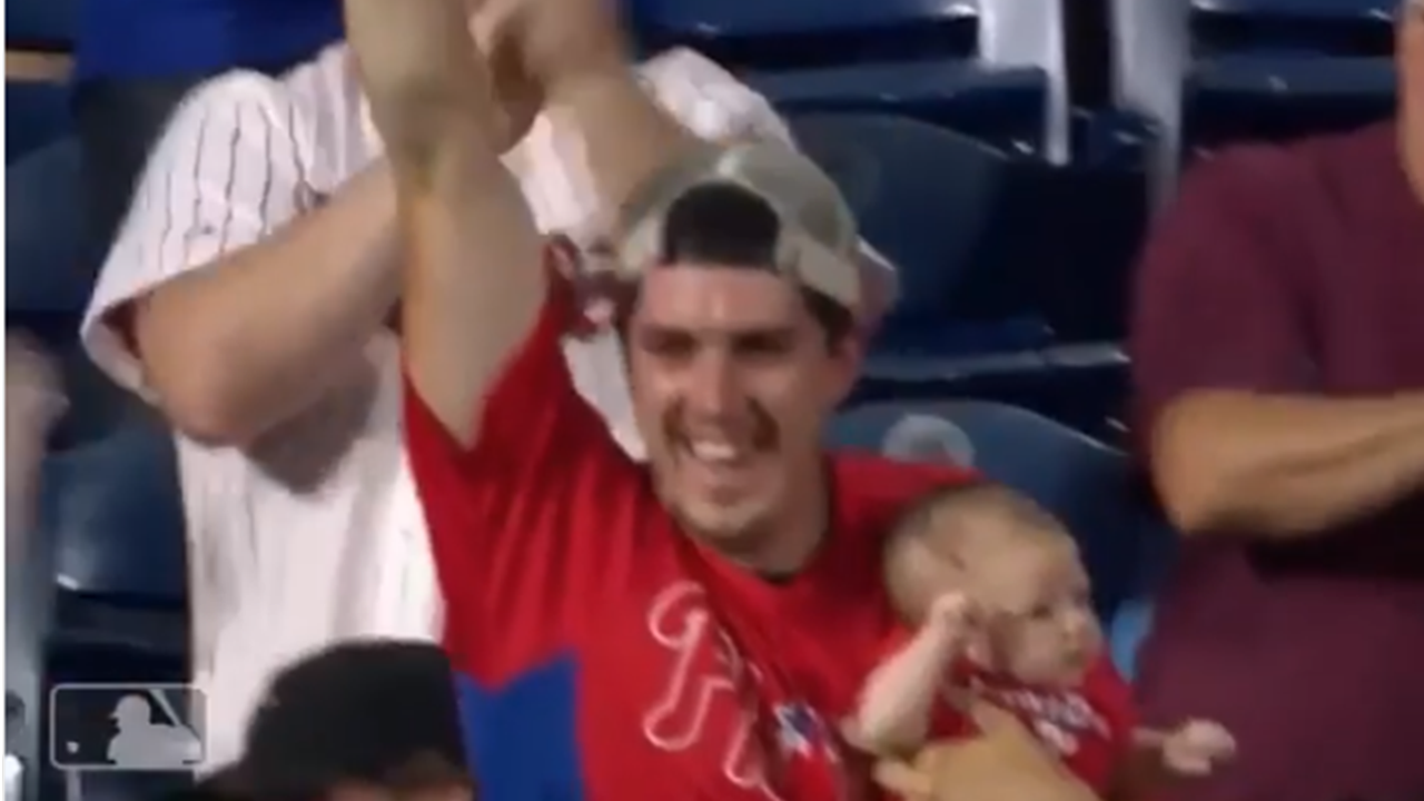 Dad Catches Home Run Ball While Holding Baby