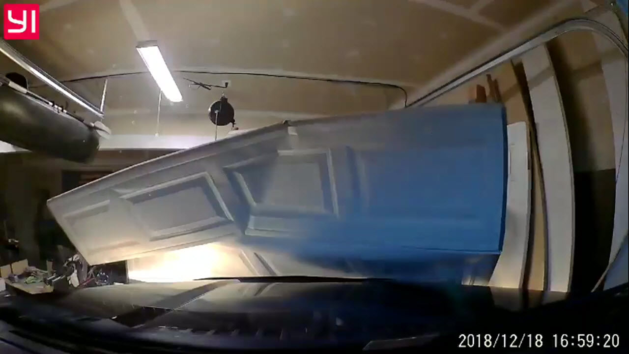 Teen Drives Through Garage Door With Dad in Car [WATCH]