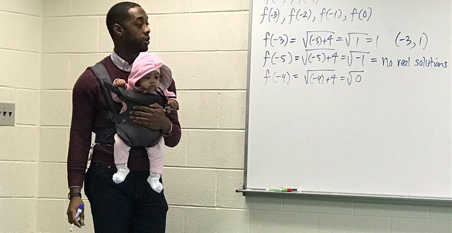 Professor Holds Baby