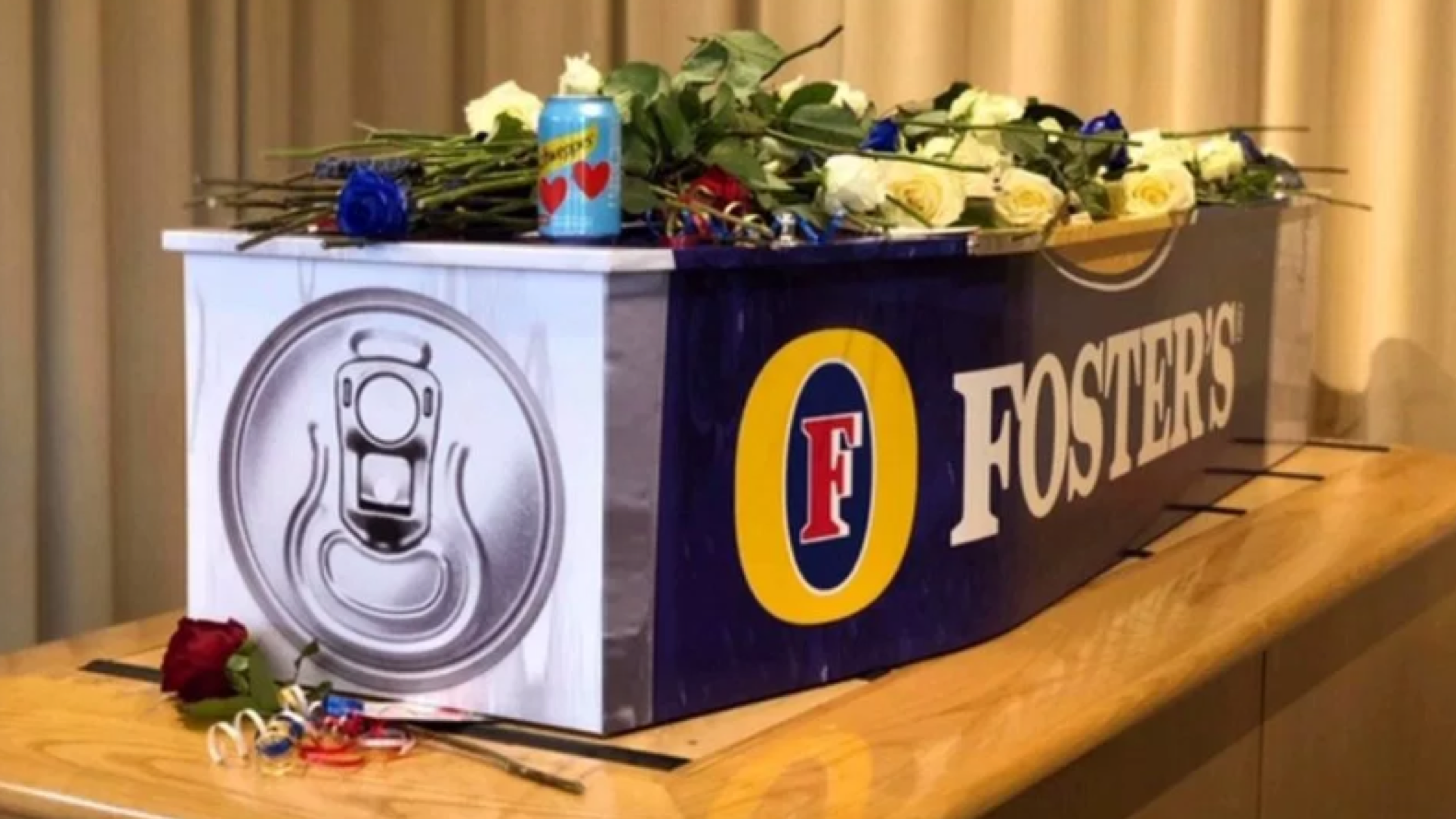 Beer-Loving Dad Gets Proper Send-off in Foster’s Can Casket