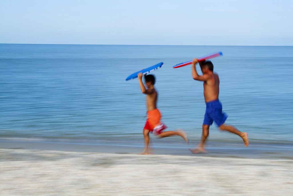Kids Running on a beach