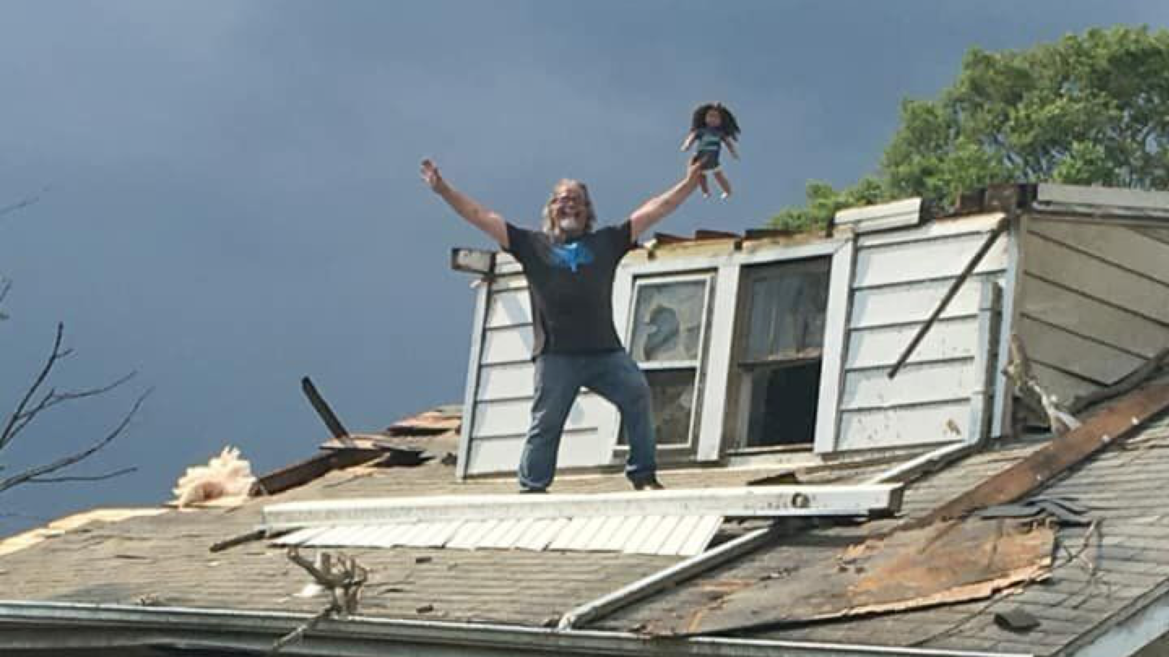 Triumphant Dad Rescues Daughter's Doll From Tornado Stricken House