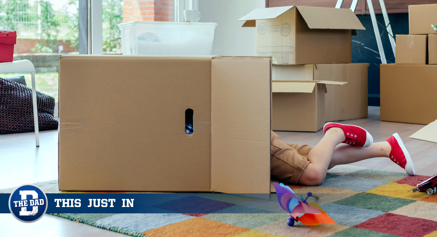 Boy Discovers Toy in Box