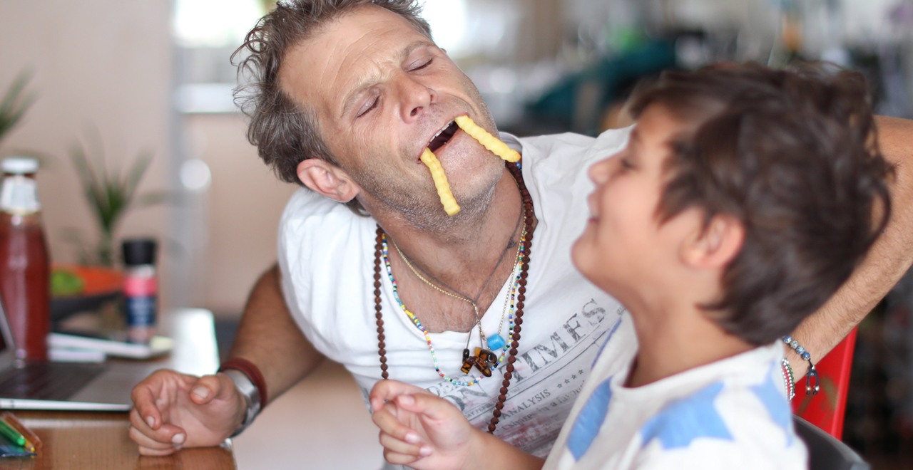 Dad Eating Fries with Son