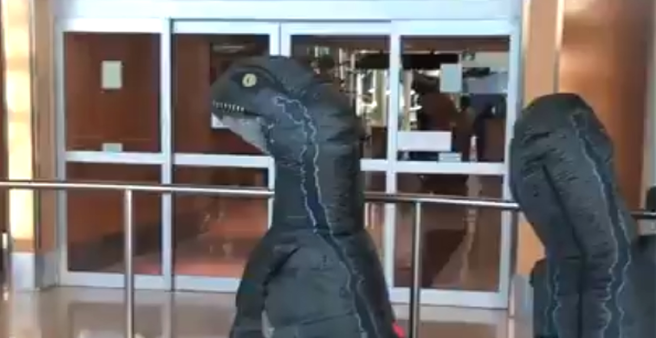 Kids Dress as Dinos at Airport