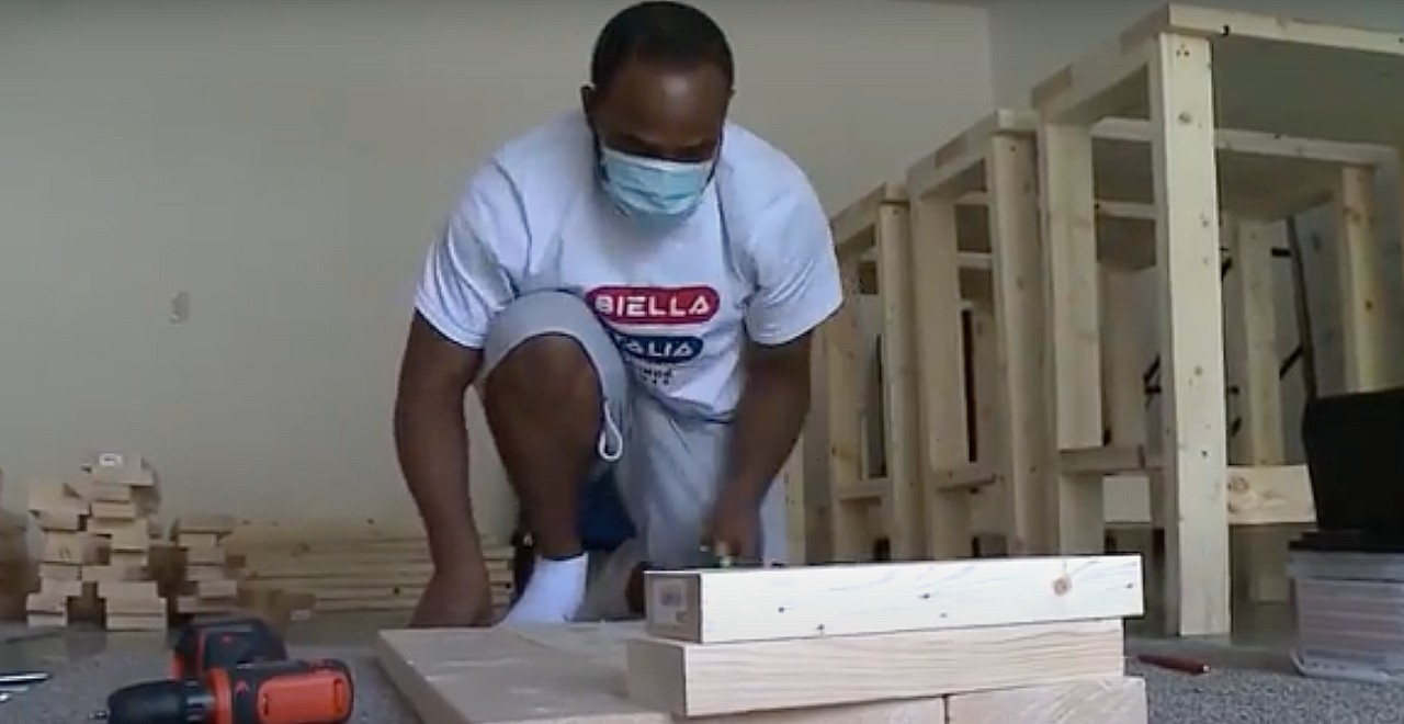 Dad builds desks for kids who need them