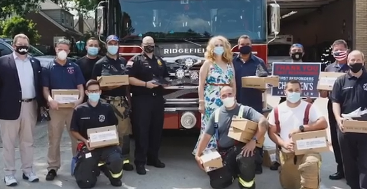 The Rock Gifts Shoes to Firefighters