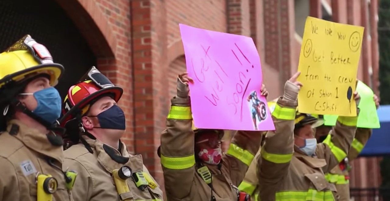 Firefighters surprise colleague's son battling cancer