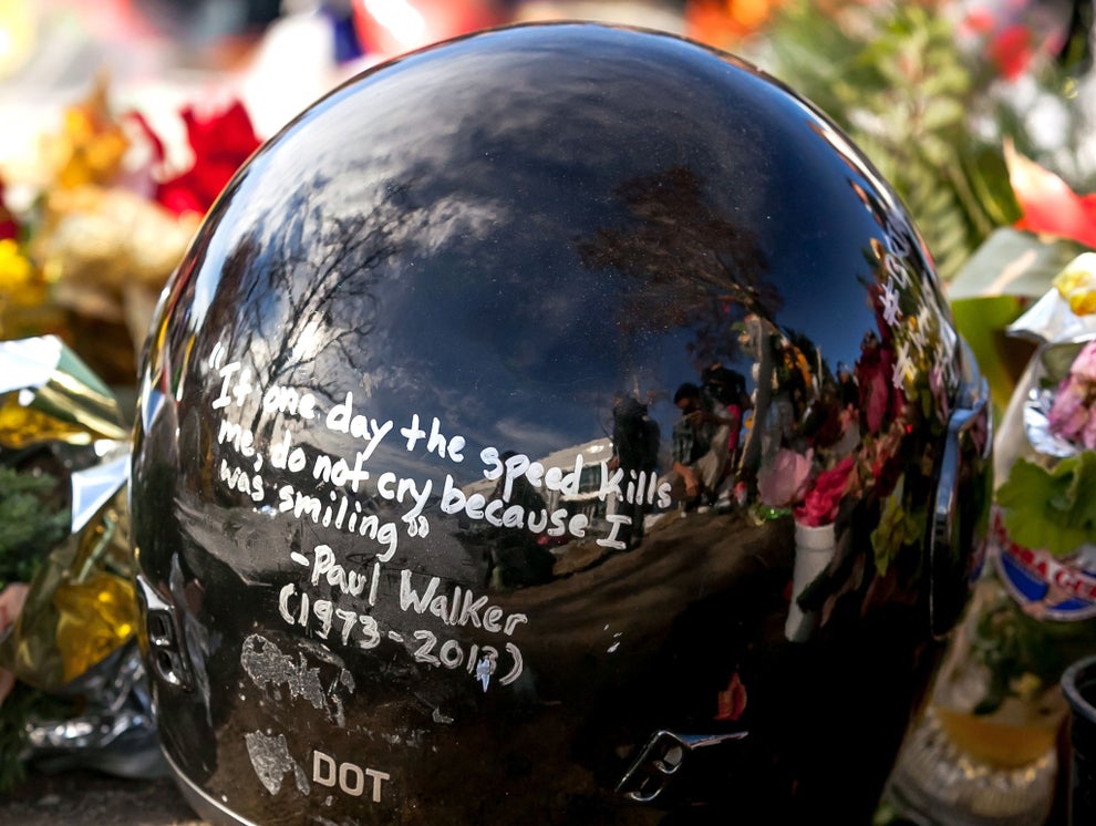 a helmet with signatures to remember Paul Walker