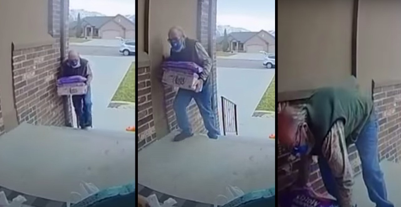 Woman helps elderly man delivering groceries