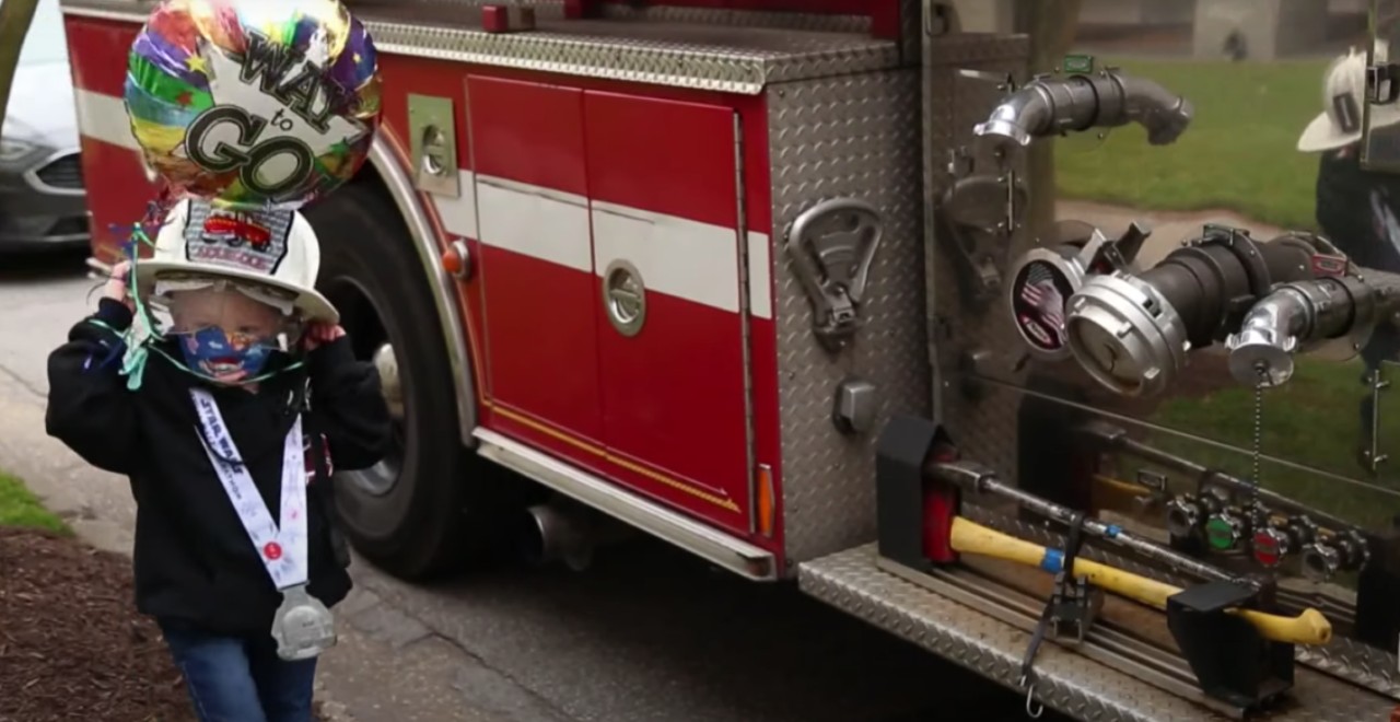 Boy Rings Dad Firetruck Bell