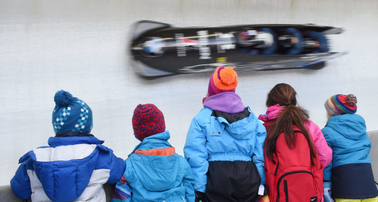 Dad builds backyard bobsled track