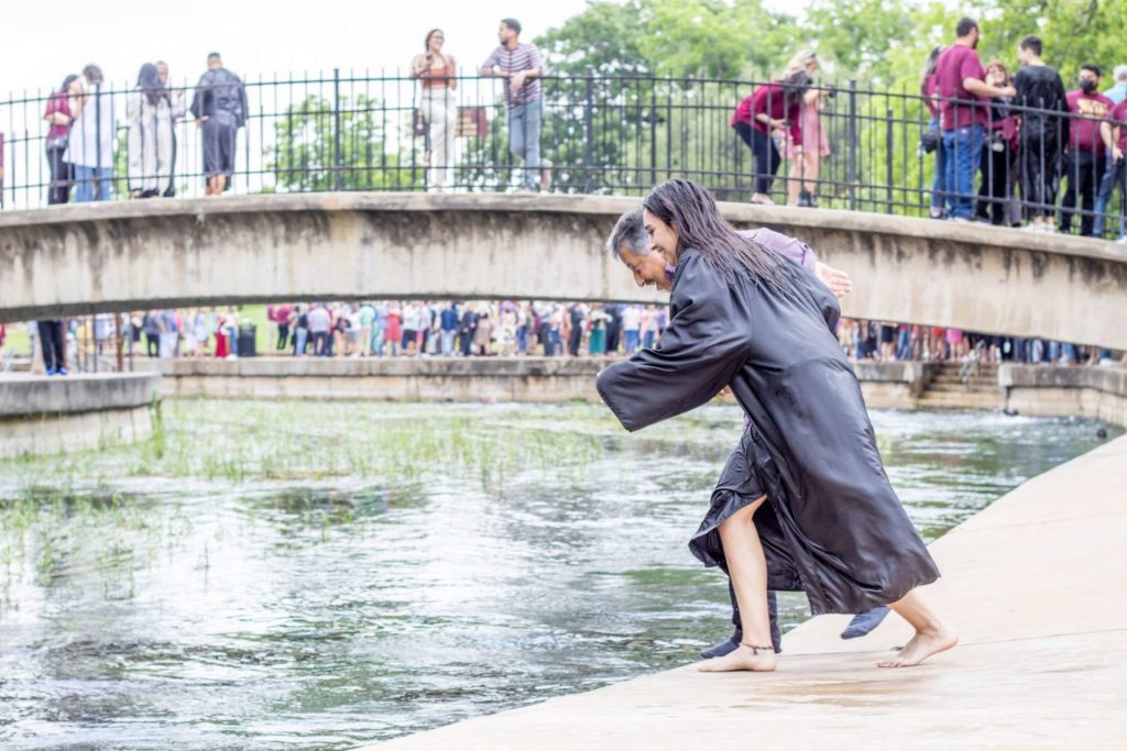 Dad and Daughter Jump Into River For Graduation