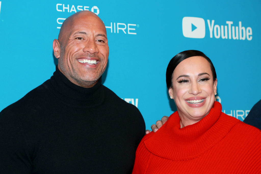 The Rock poses with manager Dany Garcia