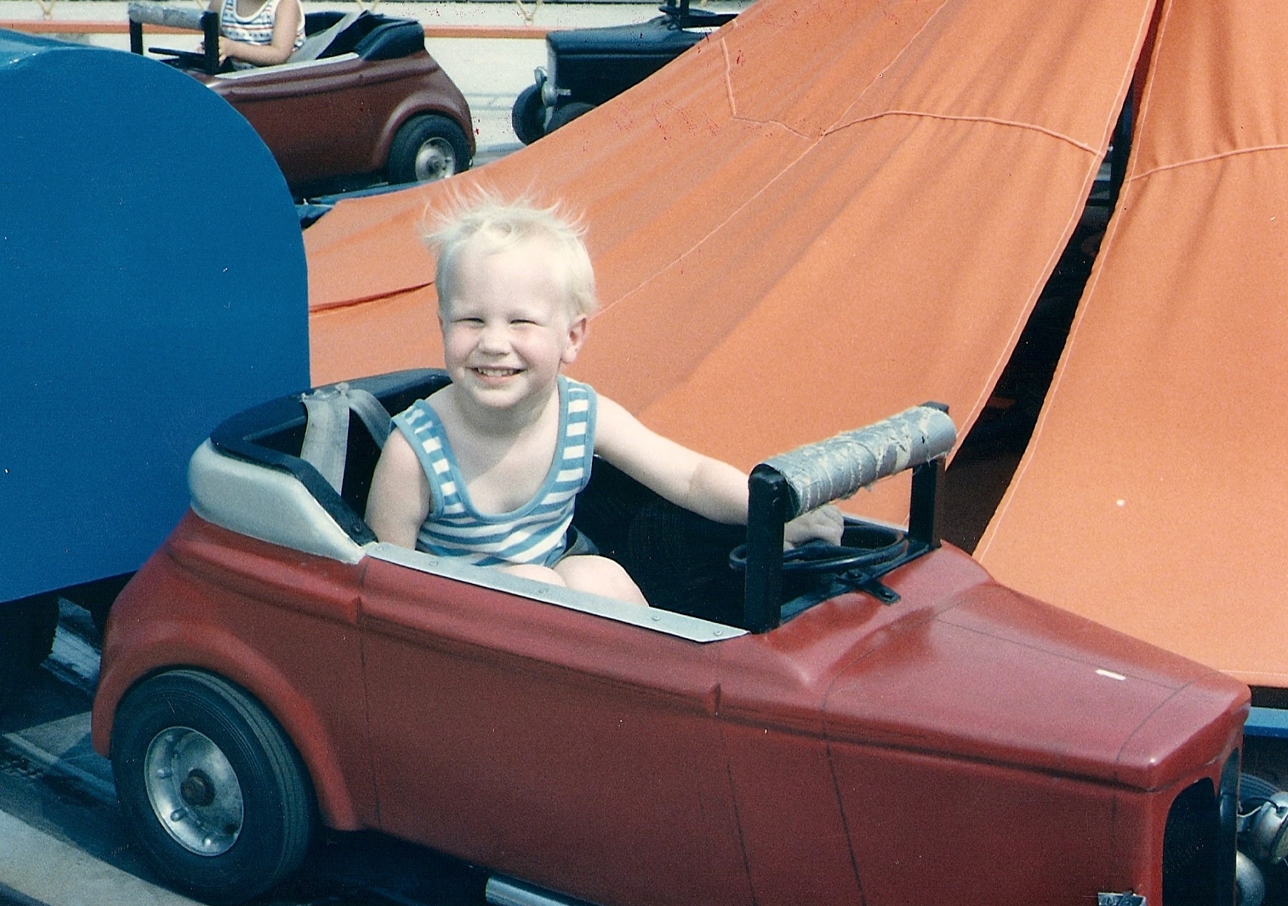 Joel Willis, 4 years old, in a car ride at Americana theme park