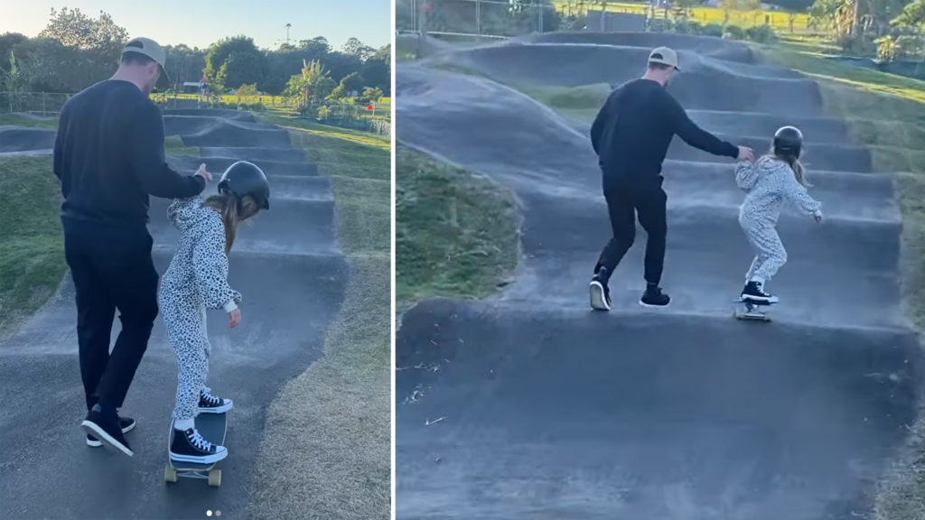 Hemsworth holds daughters hand while skateboarding