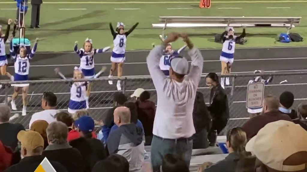 Cheer dad goes viral for unique support of his daughter's cheerleading