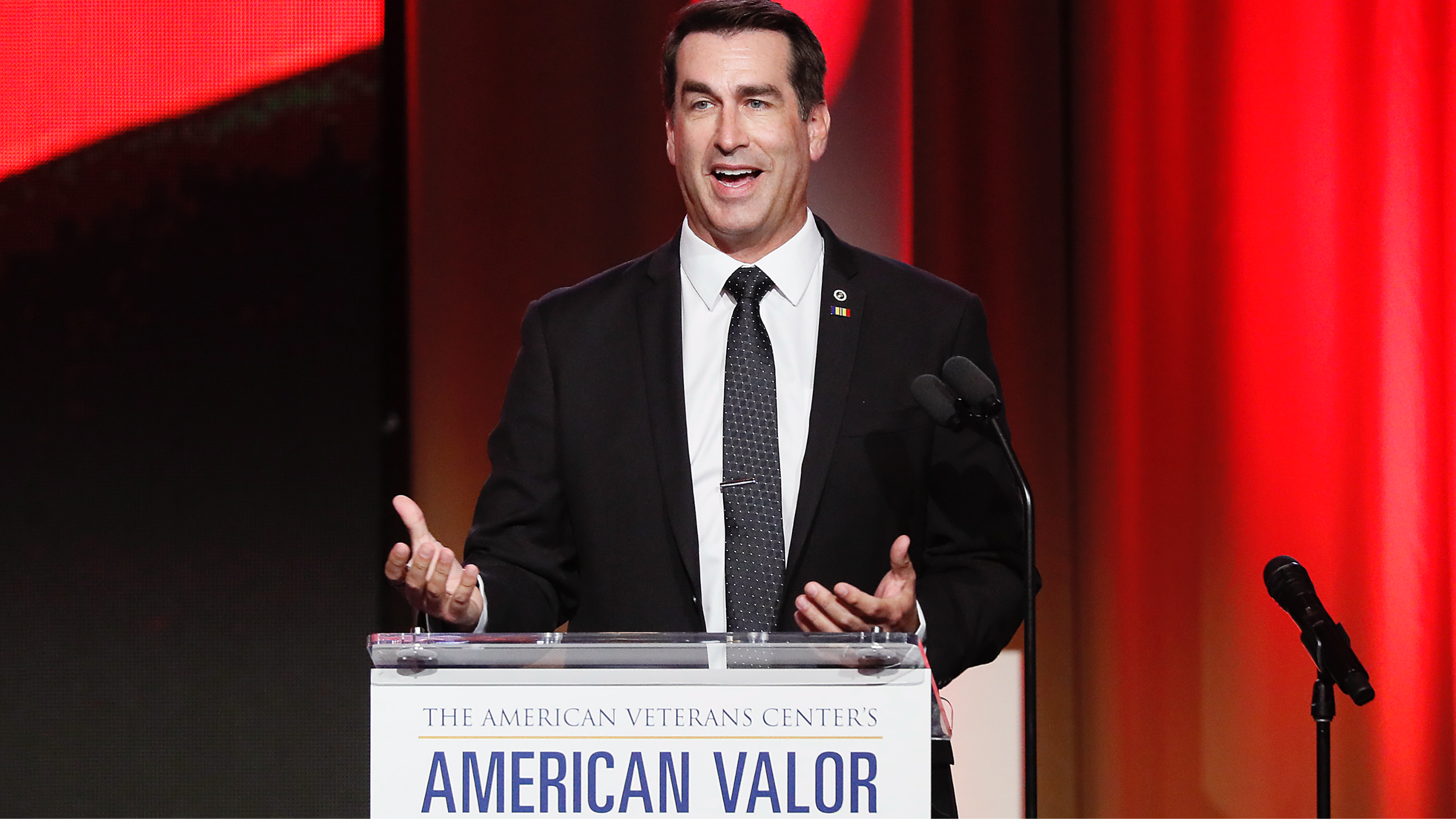 WASHINGTON, DC - OCTOBER 26: Actor/retired United States Marine Corps Reserve officer Rob Riggle speaks at the American Veterans Center’s "2019 American Valor: A Salute to Our Heroes" Veterans Day Special at the Omni Shoreham Hotel on October 26, 2019 in Washington, DC. (Photo by Paul Morigi/Getty Images)